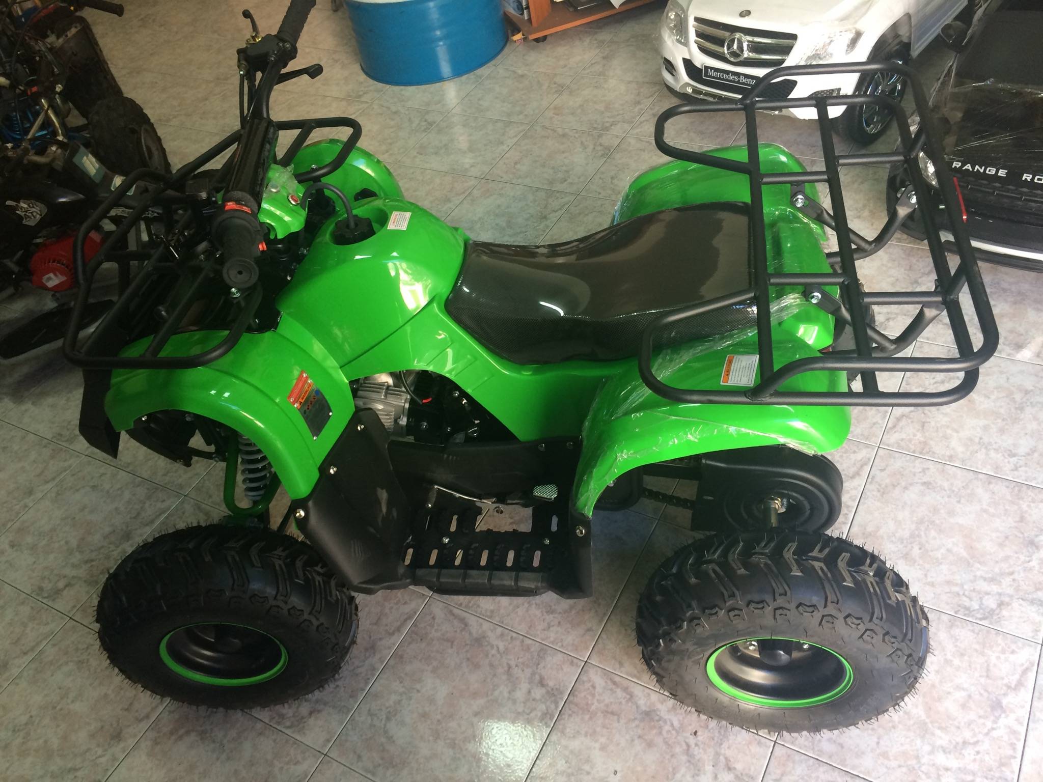 QUAD HUMMER 125cc 4T RUOTA 7" AVVIAMENTO ELETTRICO,LUCI,TELECOMANDO,RETOMARCIA - immagine 8