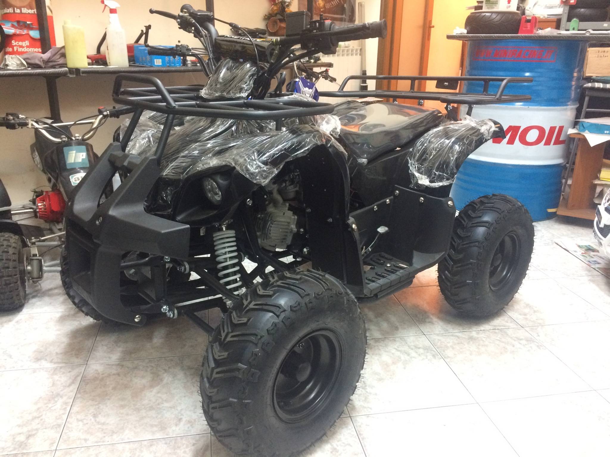 QUAD HUMMER 125cc 4T RUOTA 7" AVVIAMENTO ELETTRICO,LUCI,TELECOMANDO,RETOMARCIA - immagine 14