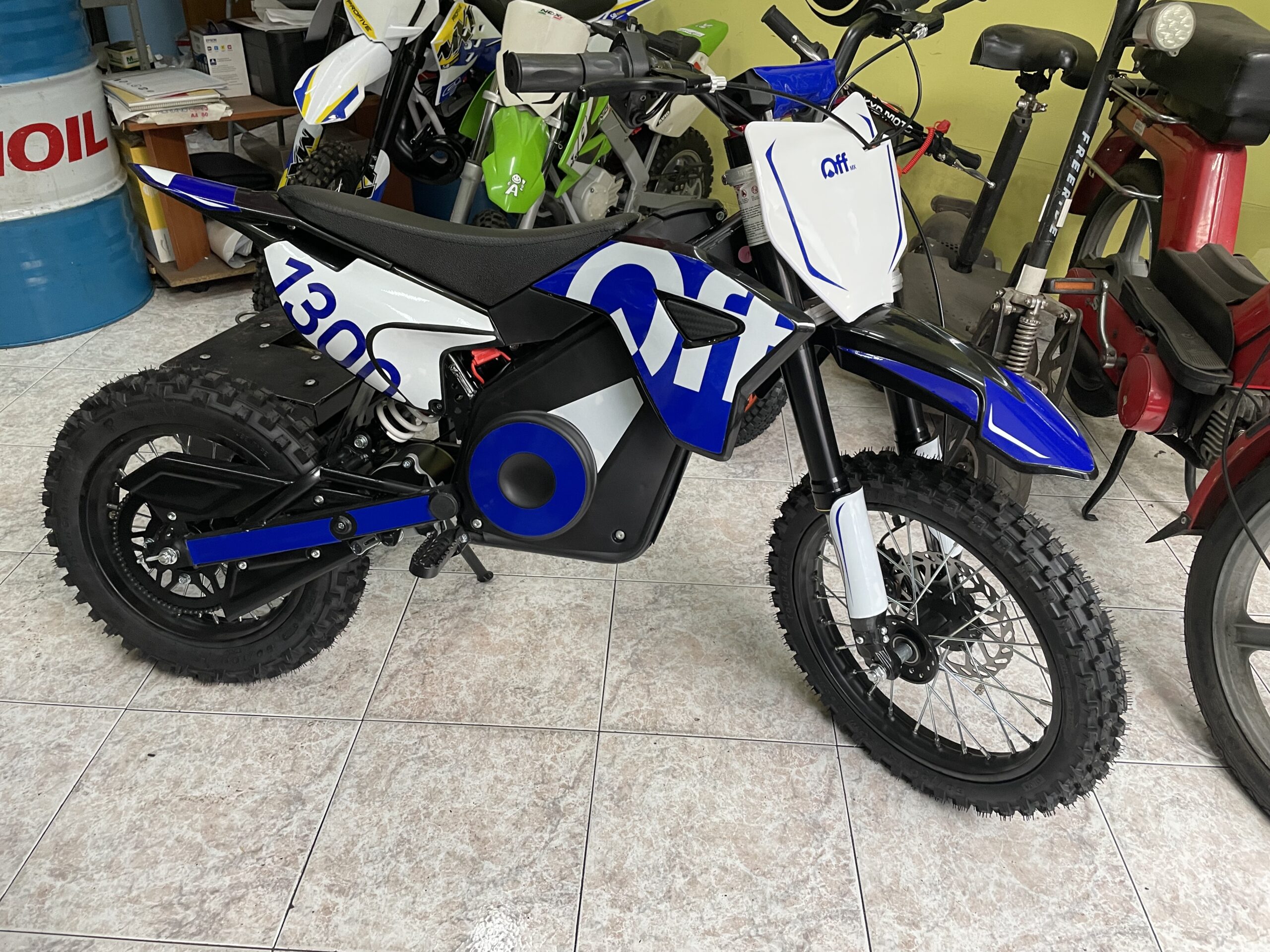 PIT BIKE ELETTRICA OFFMX 1300W LITHIO RUOTE 14"12" - immagine 7