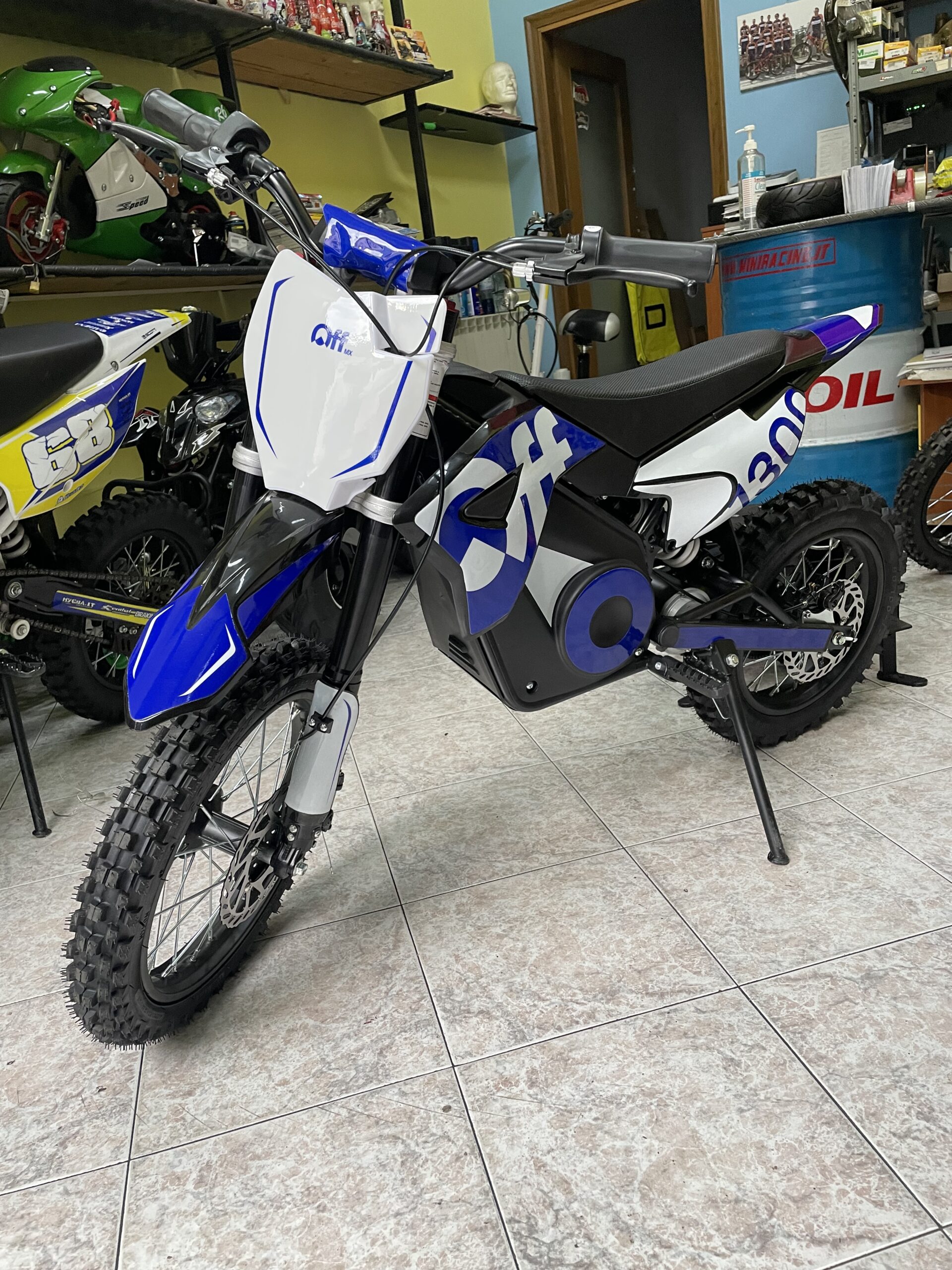 PIT BIKE ELETTRICA OFFMX 1300W LITHIO RUOTE 14"12" - immagine 5