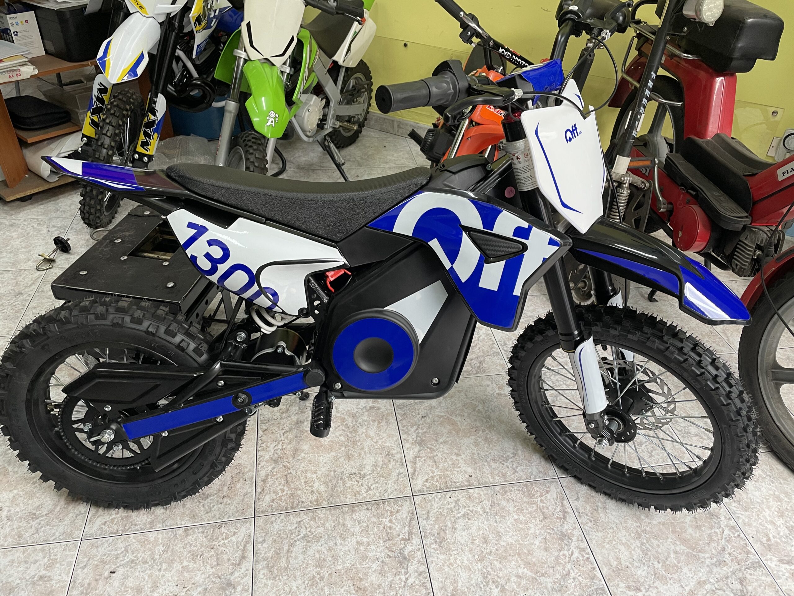 PIT BIKE ELETTRICA OFFMX 1300W LITHIO RUOTE 14"12" - immagine 4